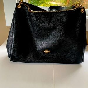 Coach purse. Black in color. It is the boho bag.